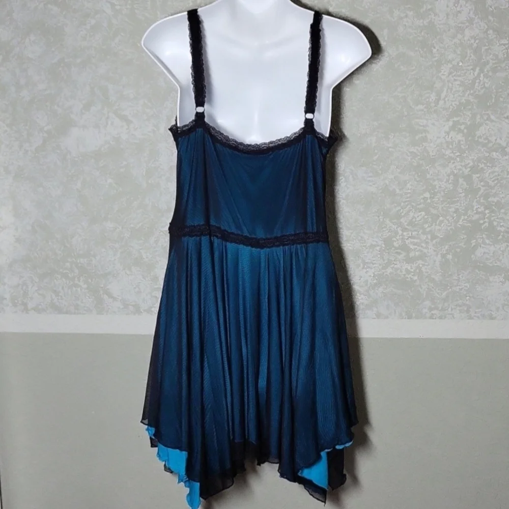 Chic Asymmetrical Teal Dress with Black Trim - Picture 6 of 9